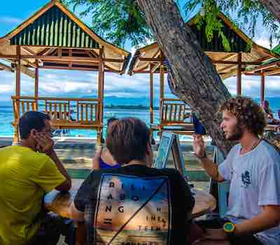 Dive briefings in front of the shop at Gili Meno.